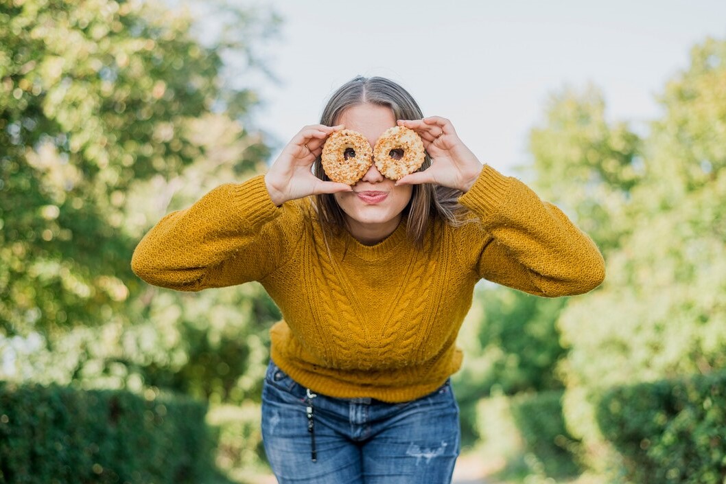 low-angle-girl-with-doughnuts- gluten free