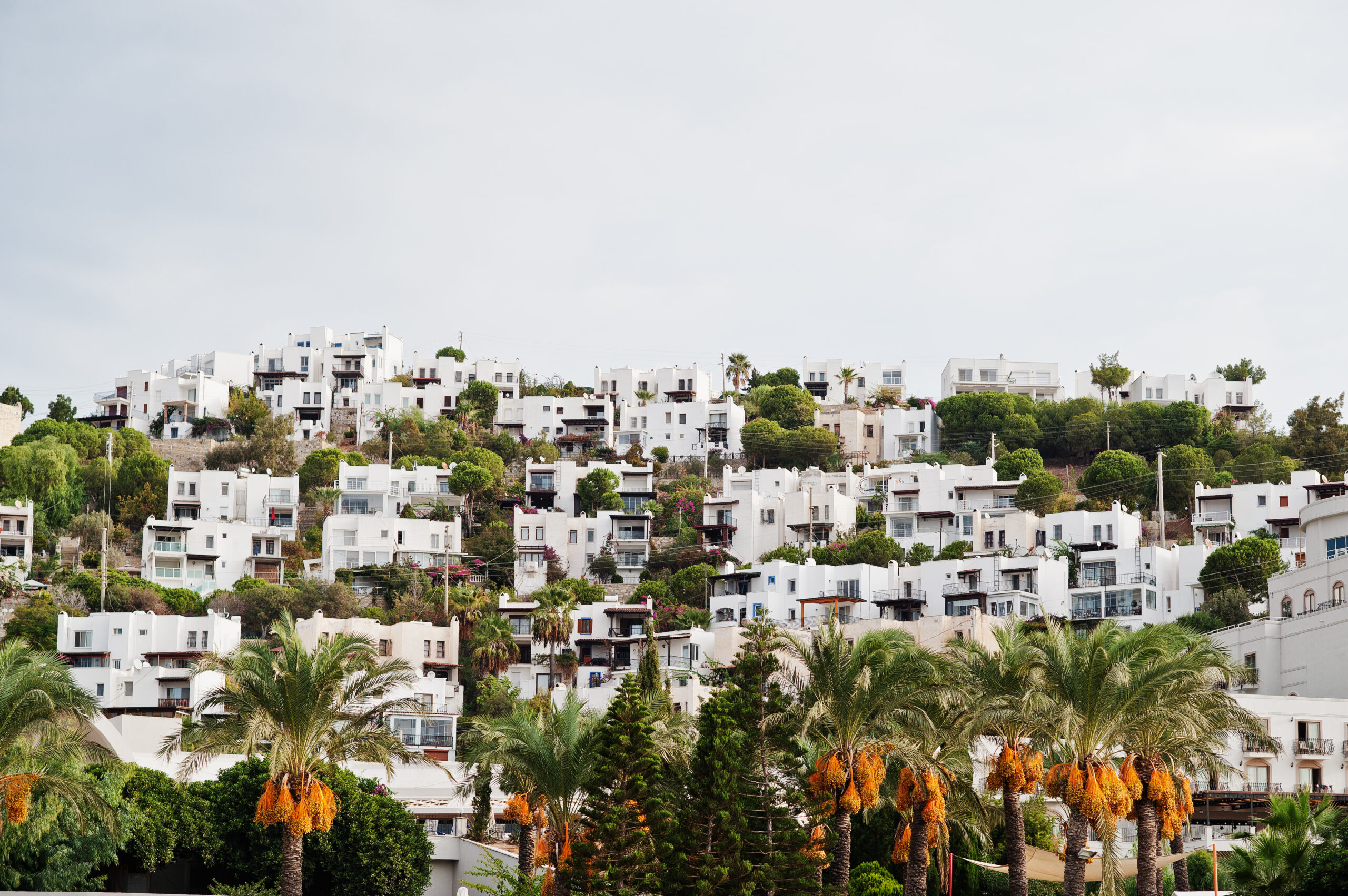 Beautiful scenic landscape with small buildings on mountain with