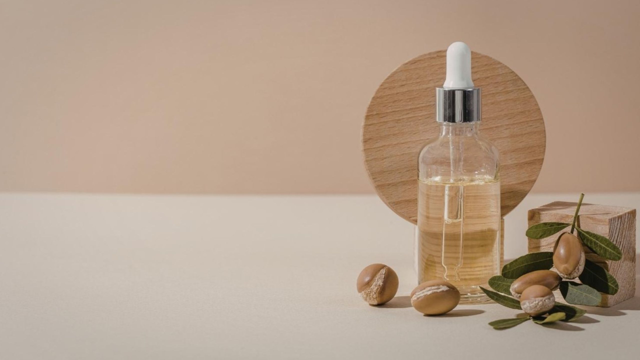 Argan oil beauty benefits with Moroccan liquid gold in authentic cosmetic bottle for skincare