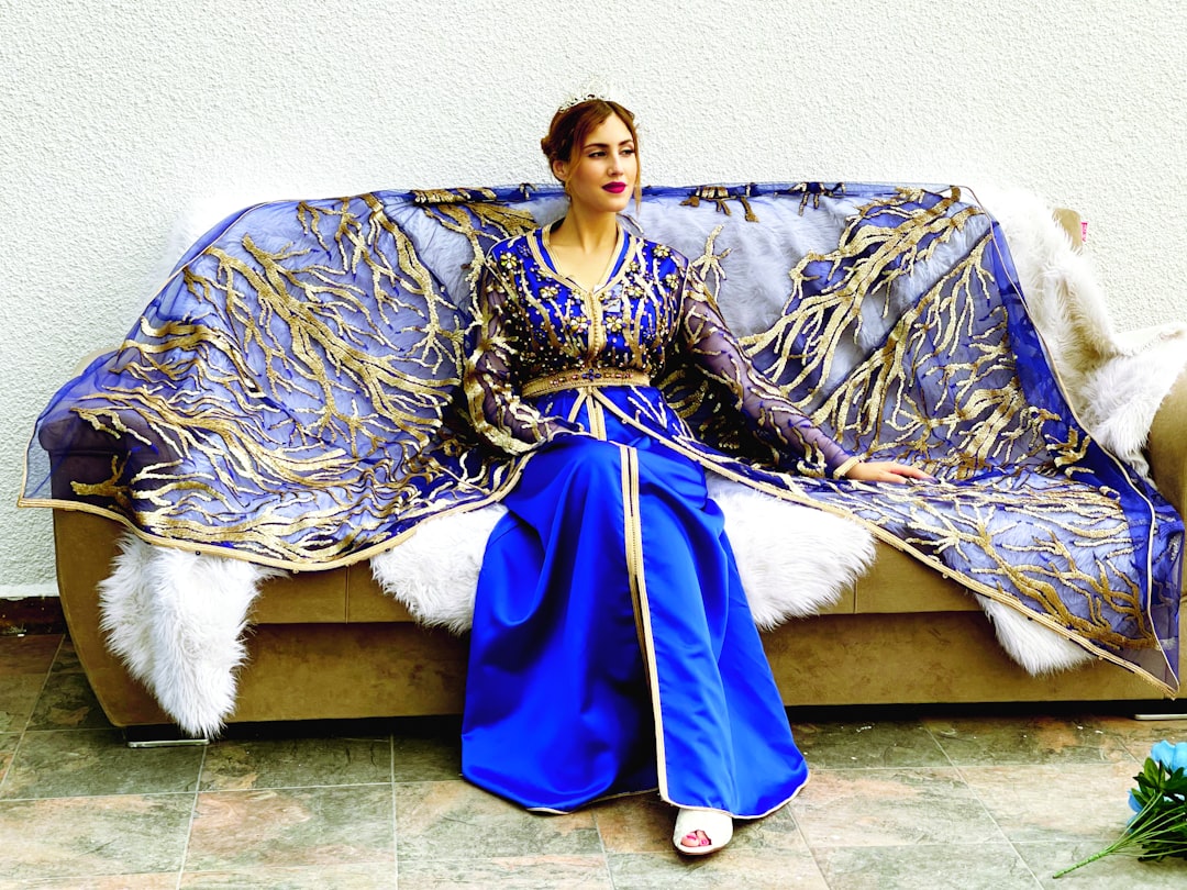 A Moroccan designer showing how Moroccan designers bridge royal textile heritage and modern fashion.